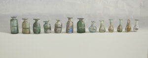 A row of Roman bottles by Lillias August